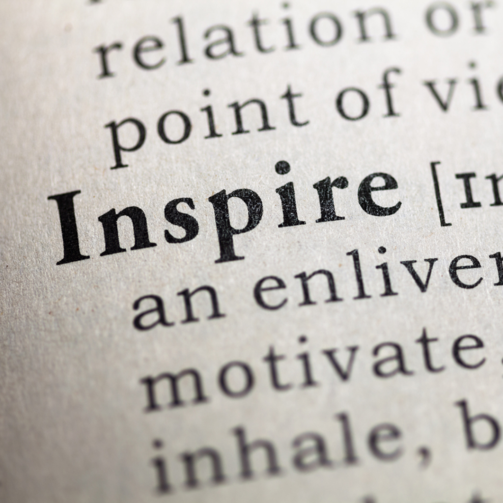 Image of the page of a dictionary with a portion of the definition for the word "Inspire" showing